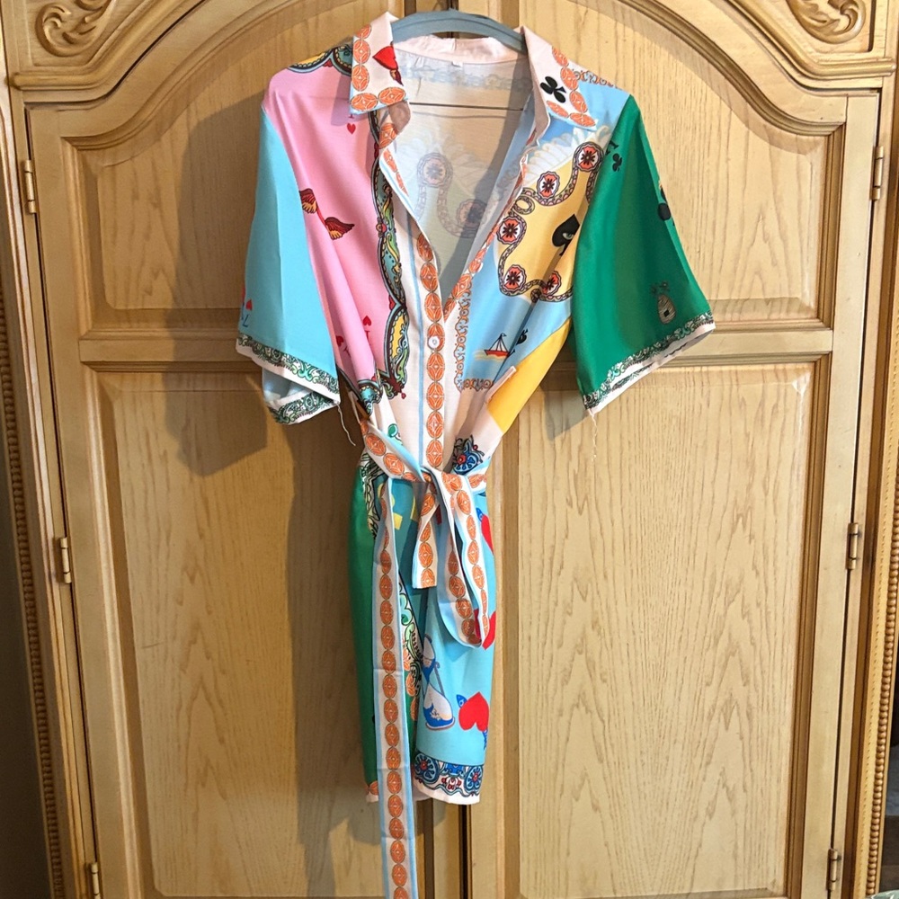 Really nice dress cotton size xlarge fits like a large new never worn no tags